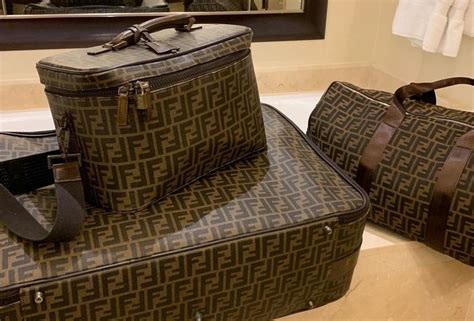 fendi suitcase with eyes on it price|Fendi luggage sets.